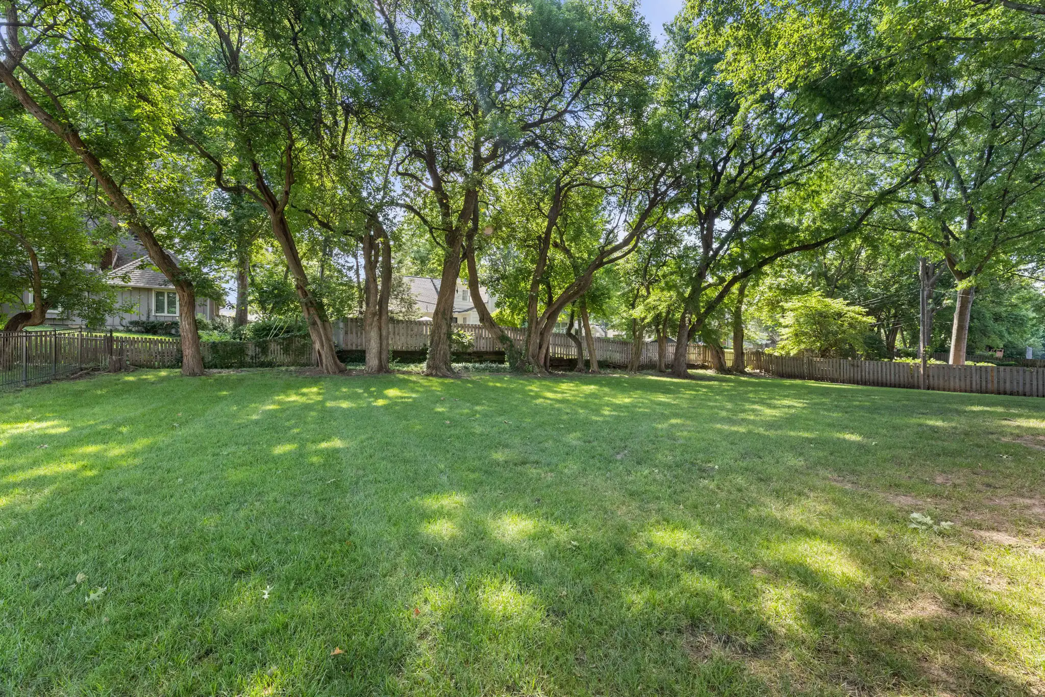 Tree-lined backyard, Apple Valley Estates, Overland Park