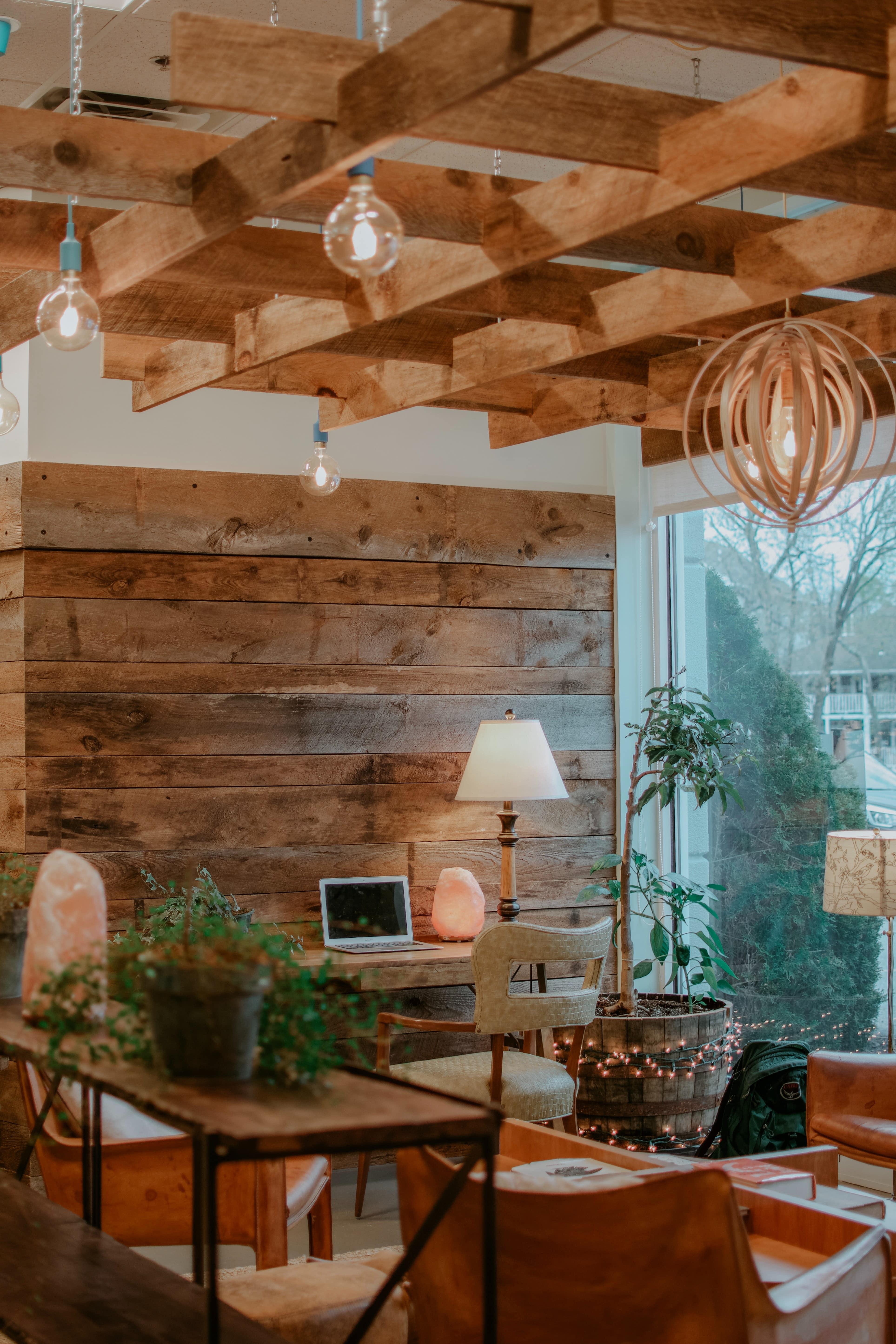 An indoor living space with exposed beams and wood accents