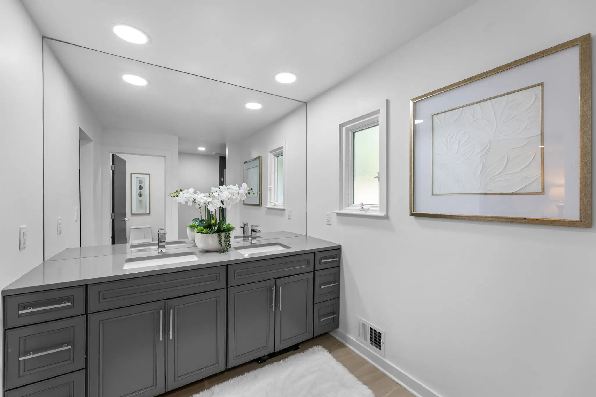 Primary bathroom with dual vanity, Apple Valley Estates home
