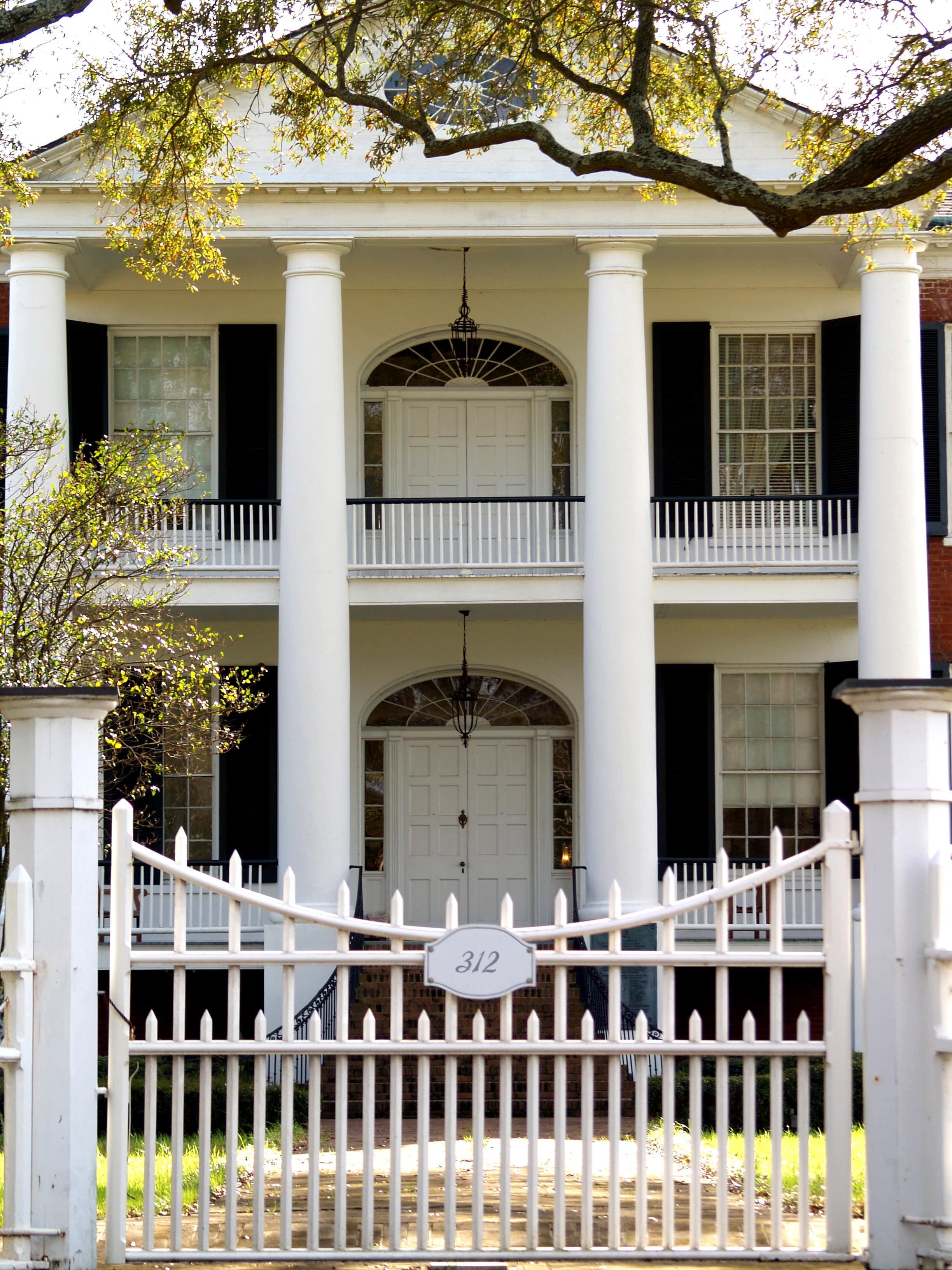 The front entrance of a French colonial home