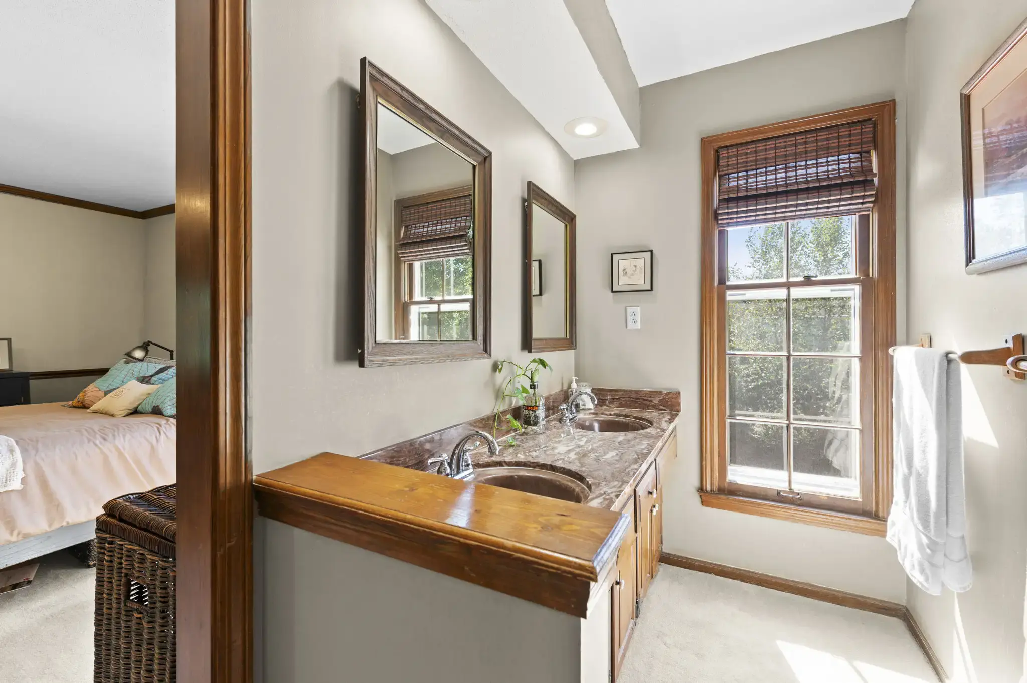 Primary bath with double vanity and natural light