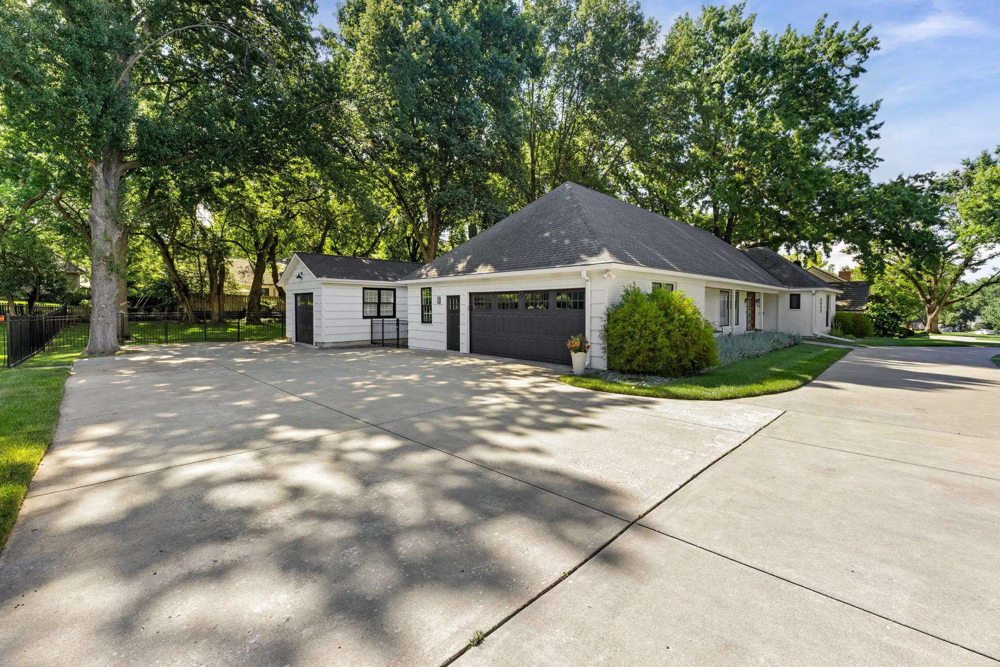 Side-entry 2-car attached garage and detached 1-car garage, Apple Valley Estates, Overland Park