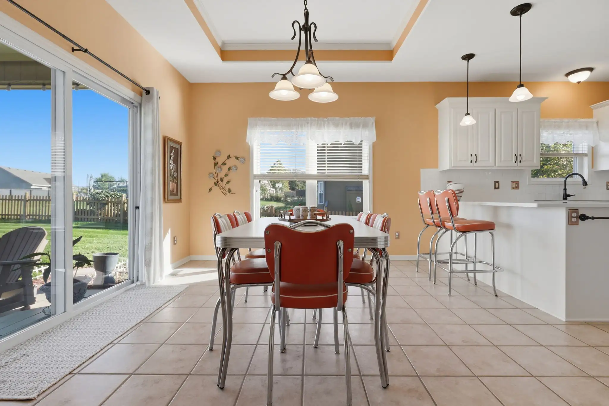 Kitchen eating area with sliding door to the covered patio