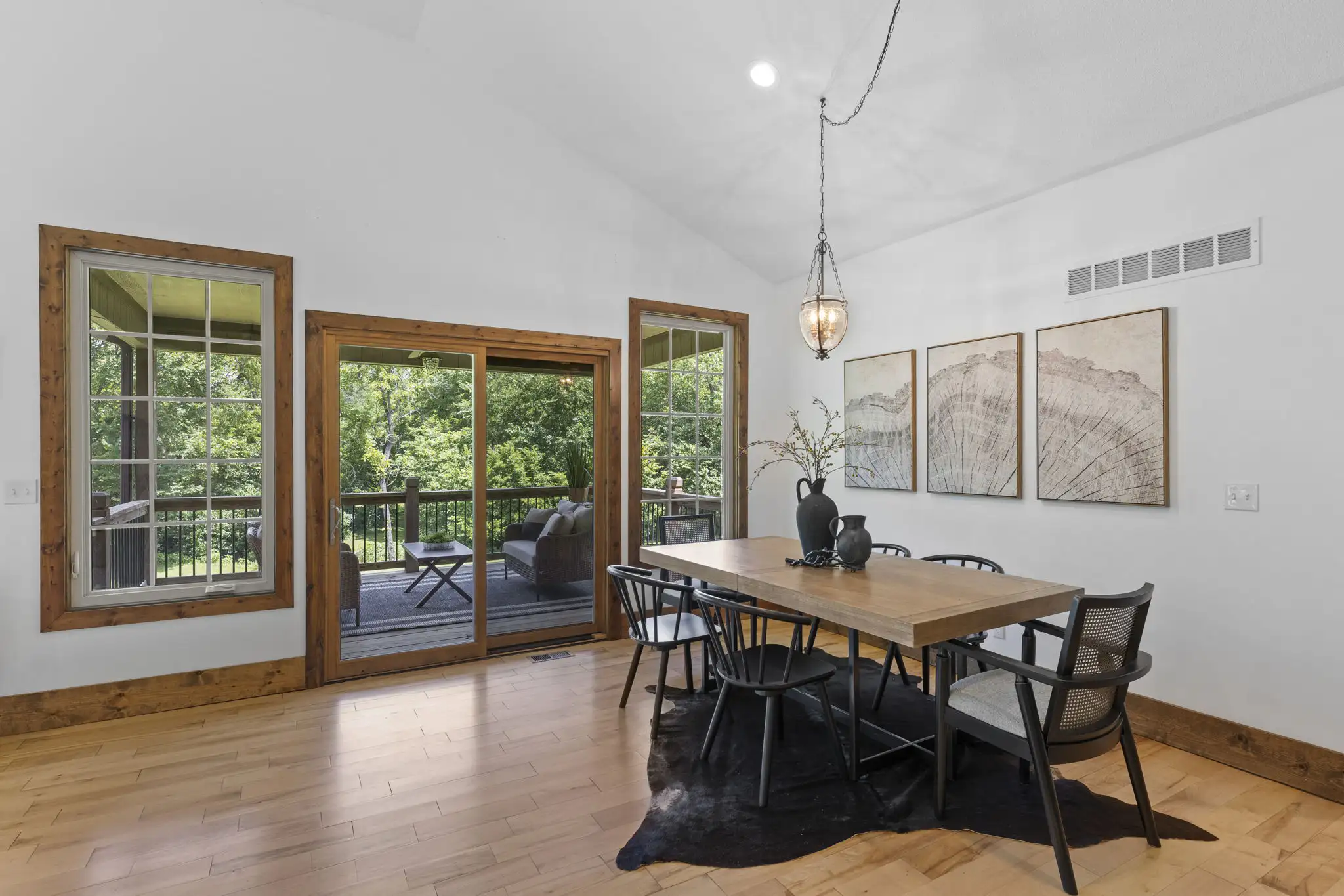 Dining area with sliding door access to the covered deck.