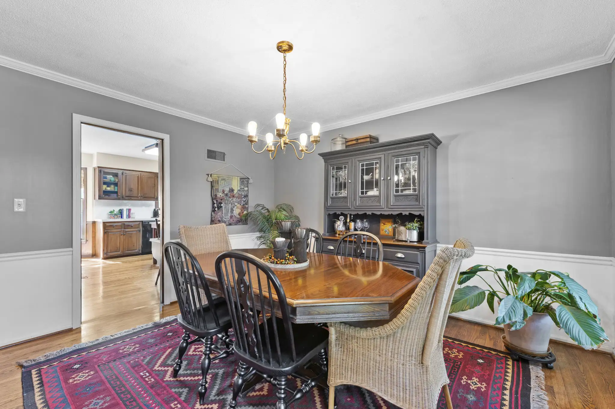 Formal dining room with hardwood floors and doorway to the kitchen