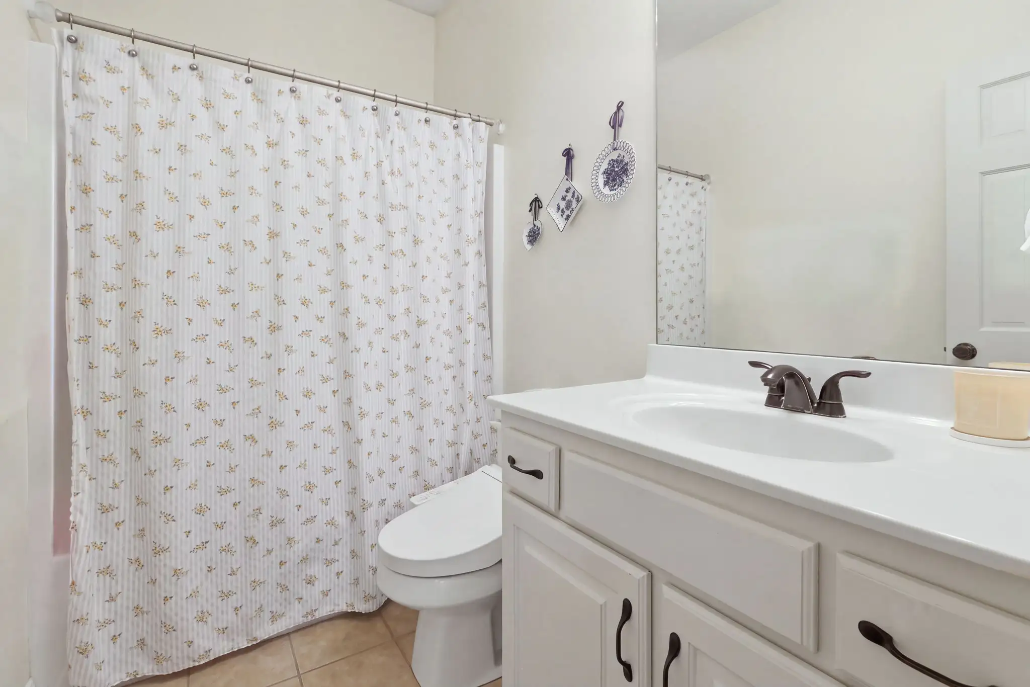 Main-level full bath with tub and shower