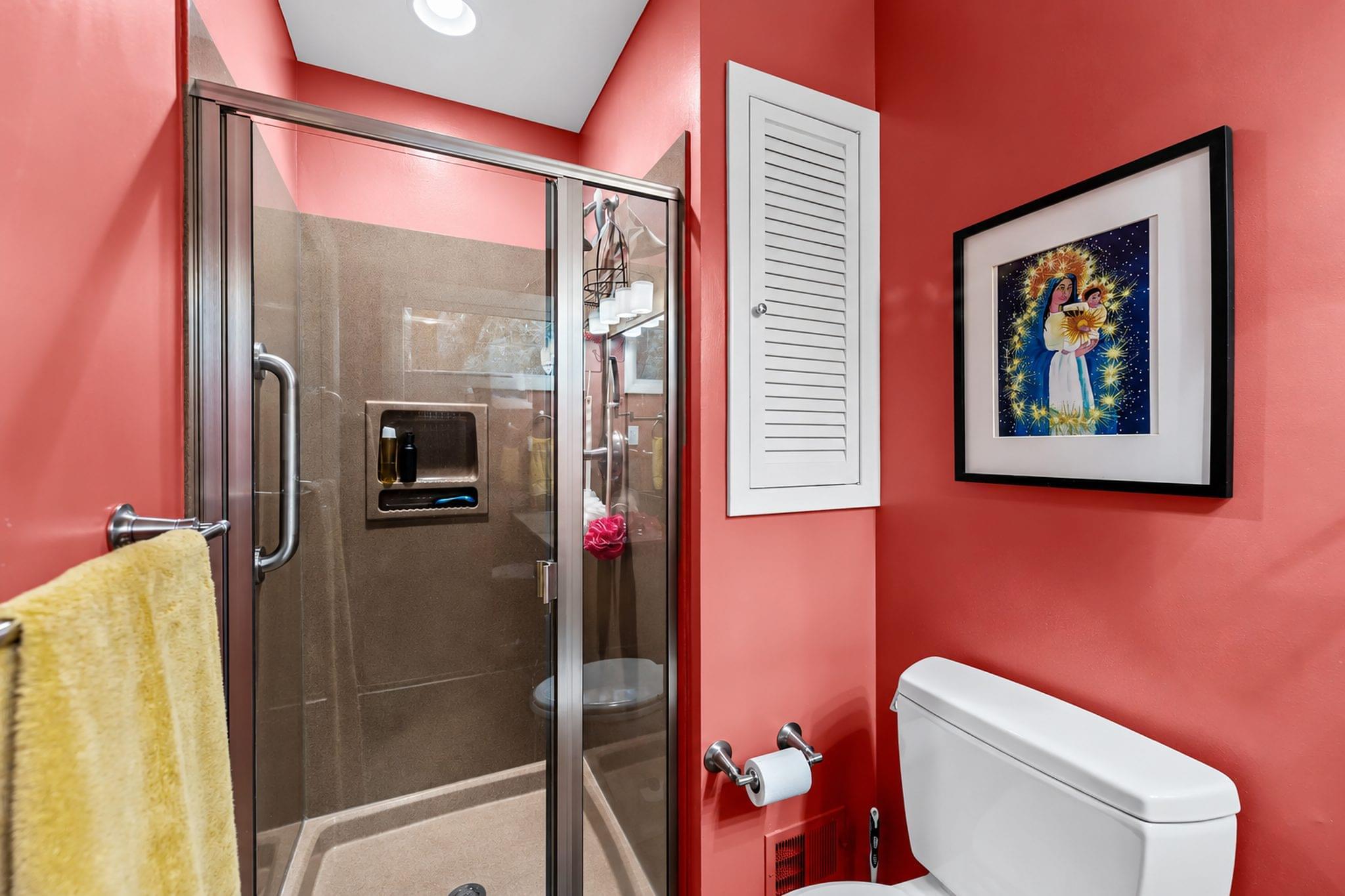 Primary bathroom with a glass-enclosed walk-in shower