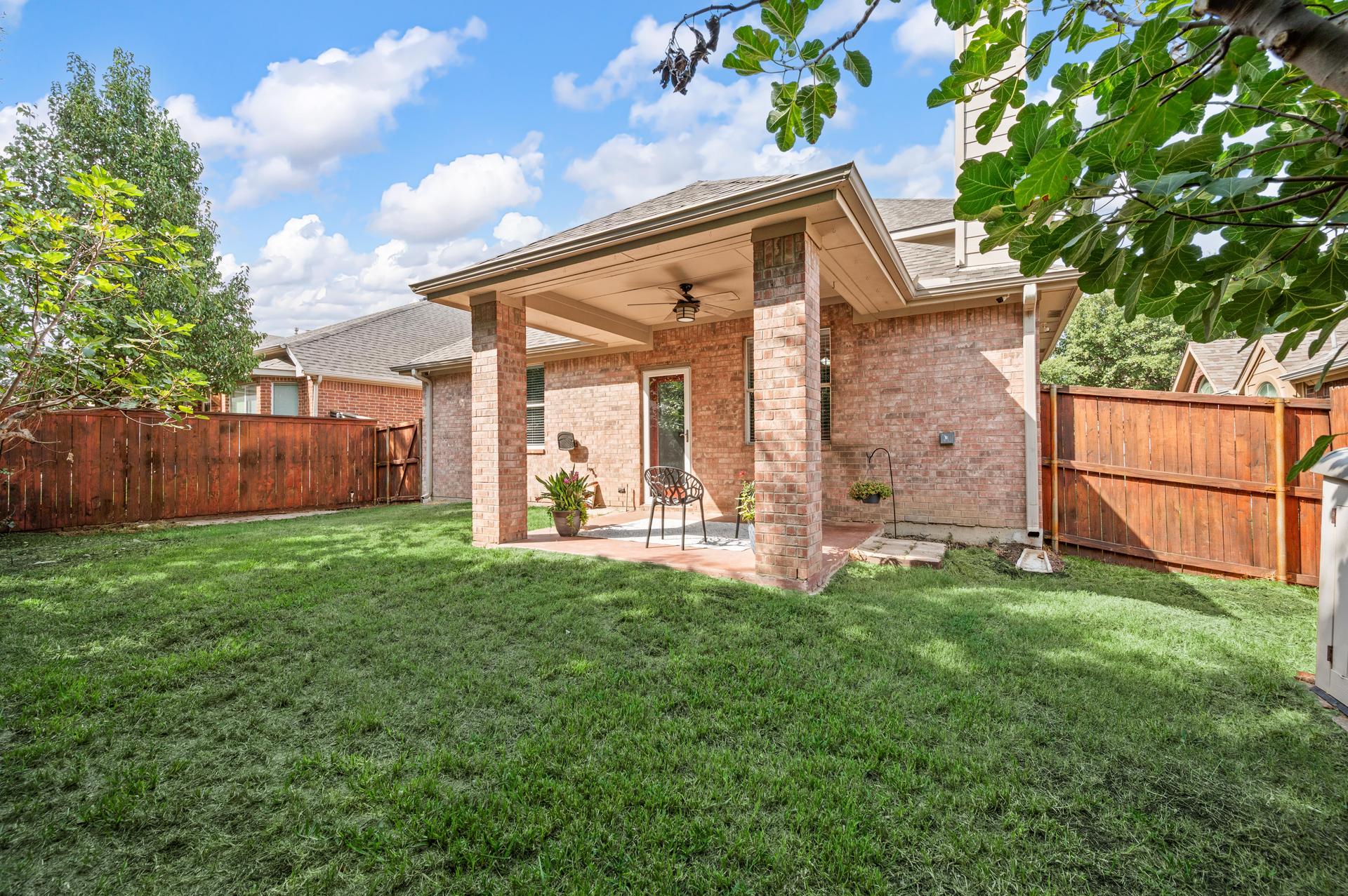 Covered Patio and Private Backyard at 4952 Paddock Drive