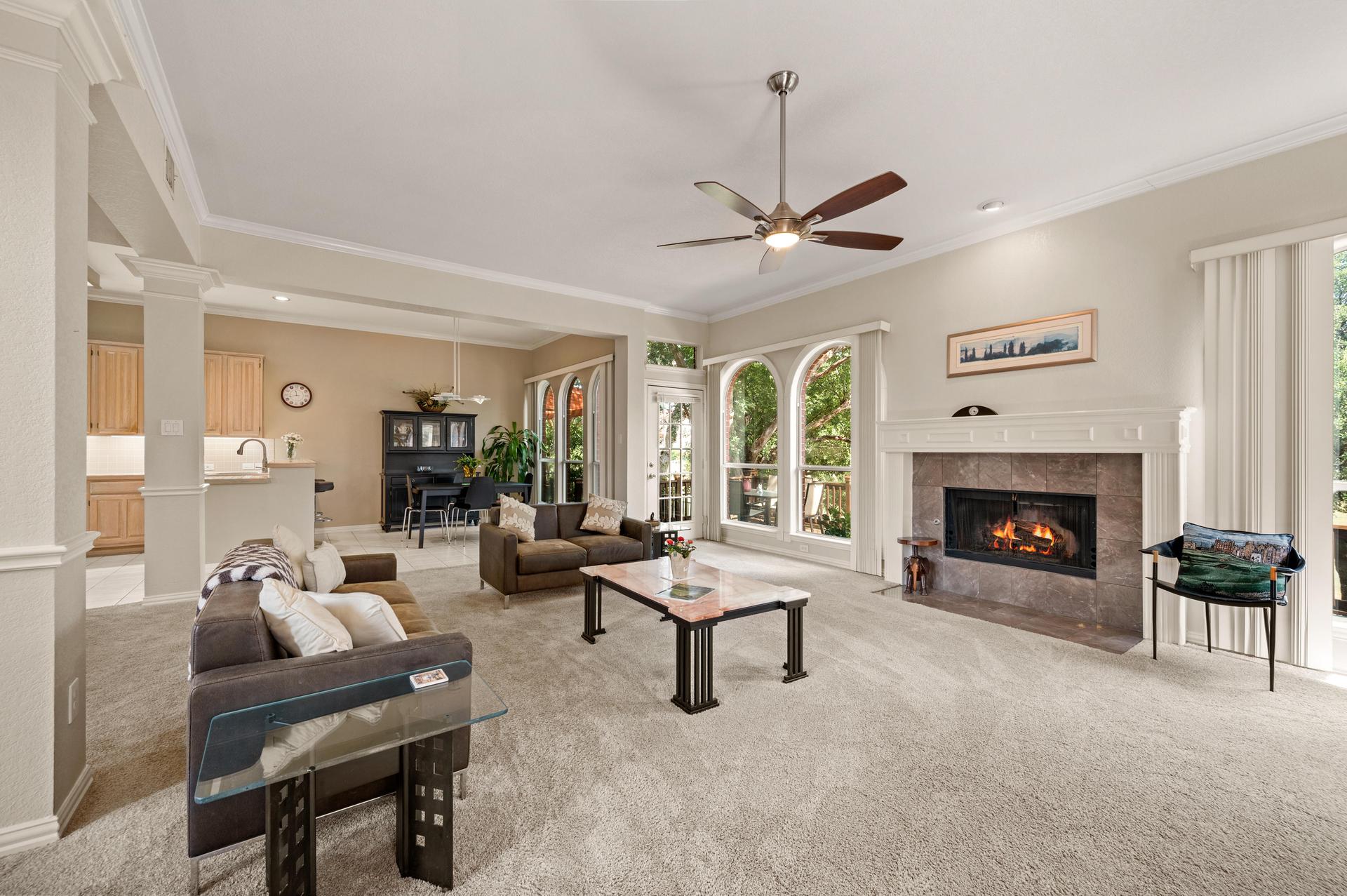Living room with fireplace at 7626 Lakecrest Circle in Irving, Texas