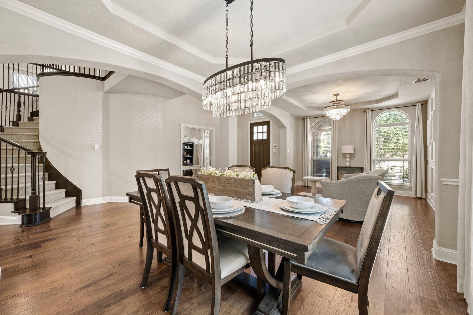 Formal dining area open to the family room at 4201 Rainwater Creek Way