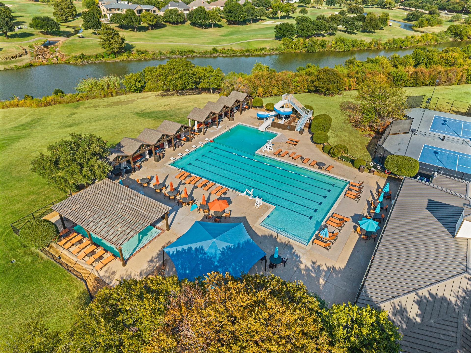 Hackberry Creek community pool and surrounding amenities near 7626 Lakecrest Circle