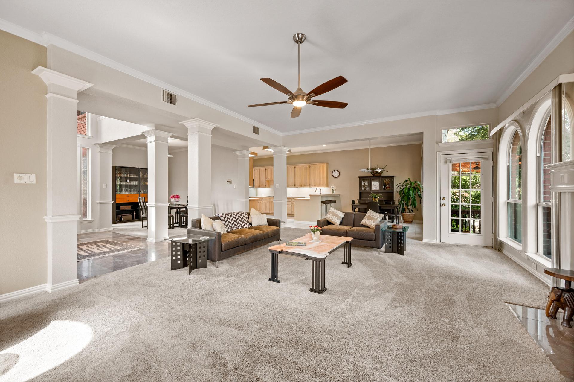 Upstairs sitting area overlooking the main living room at 7626 Lakecrest Circle