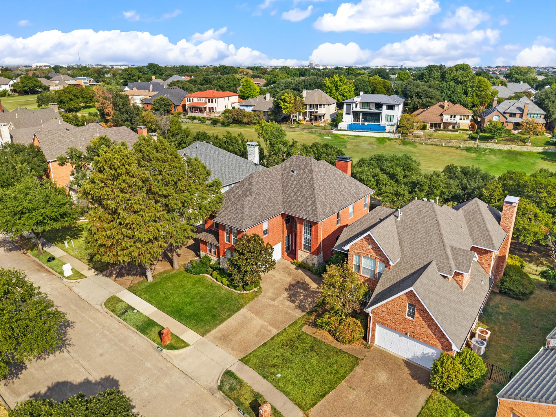 Aerial view of 7626 Lakecrest Circle and surrounding Hackberry Creek homes