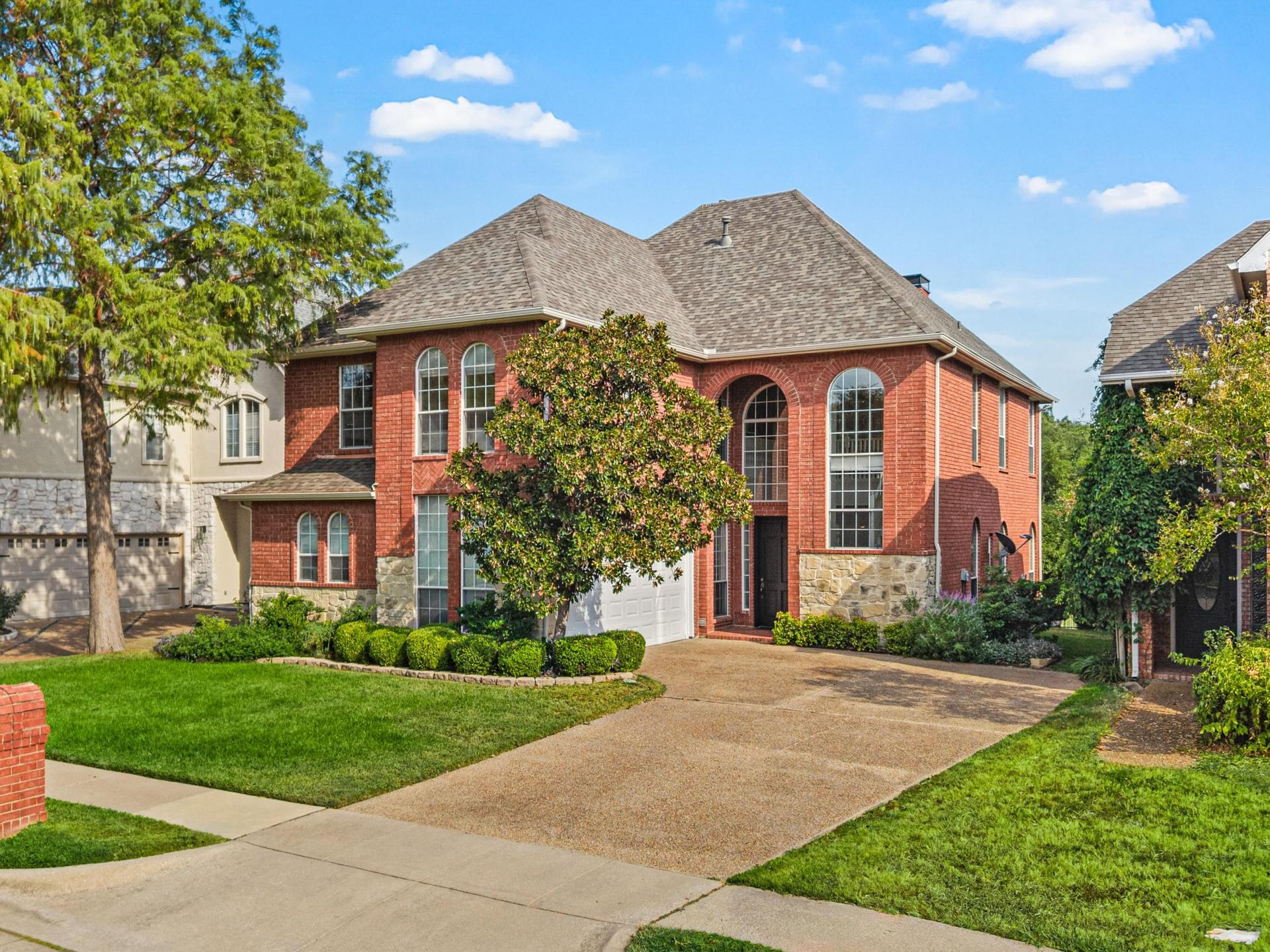 Brick front exterior of 7626 Lakecrest Circle in Irving, Texas