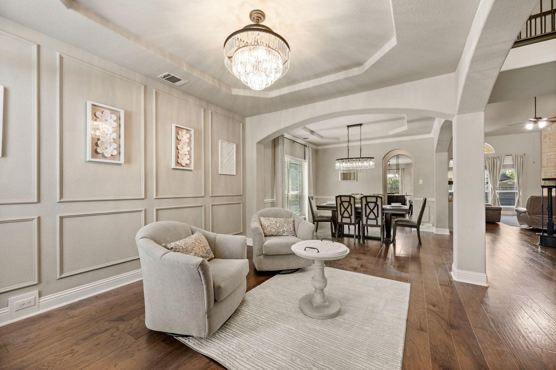 Open-concept living and dining area at 4201 Rainwater Creek Way