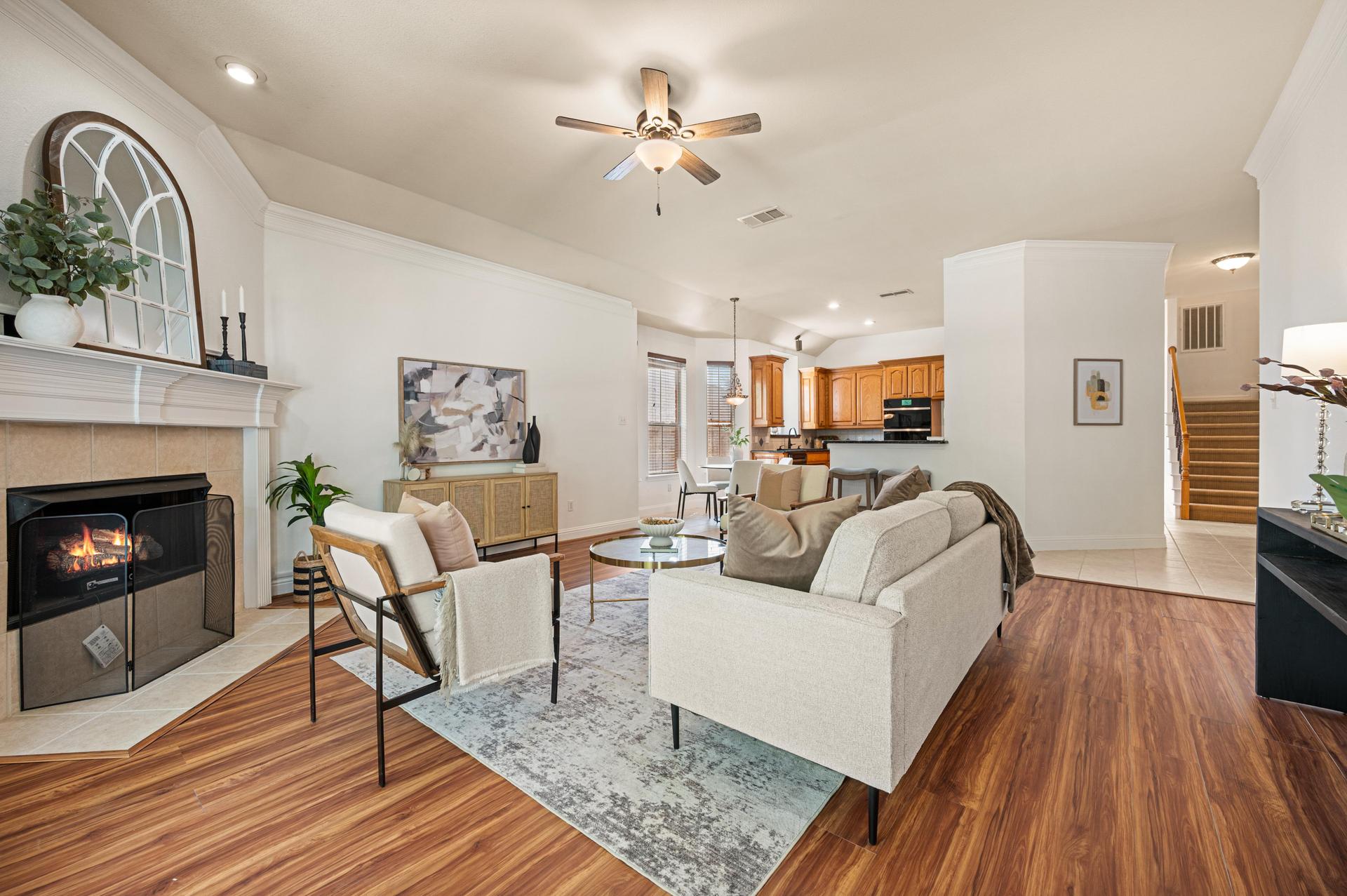 Open-concept living room at 7613 Woodhaven Drive