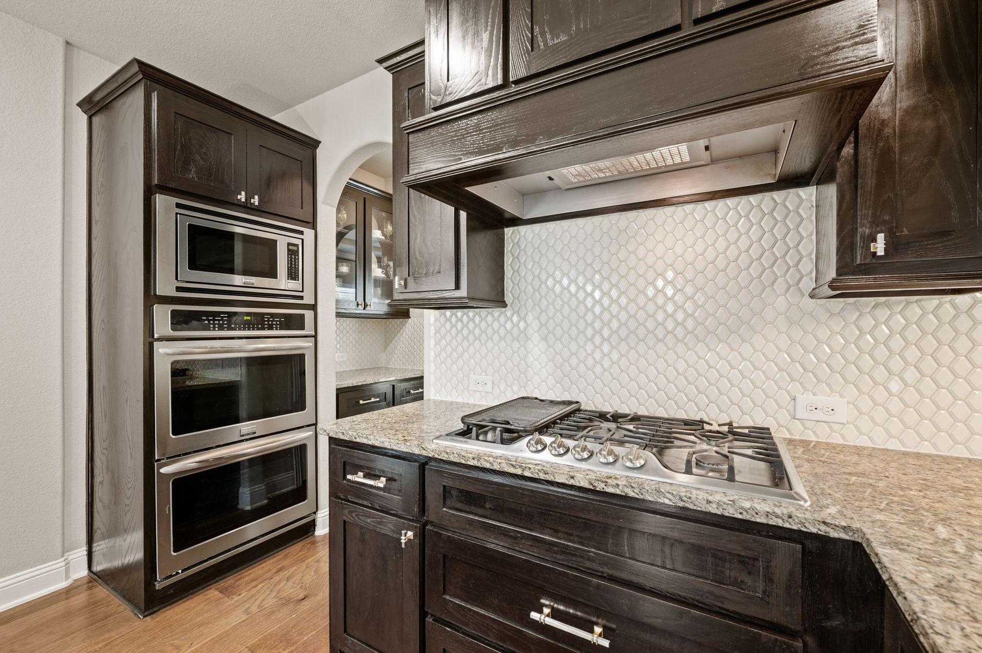 Kitchen and dining area at 4201 Rainwater Creek Way in Celina, Texas